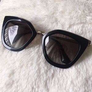 PRADA: Black+Gold Cat Eye Cinema Sunglasses-W/Case